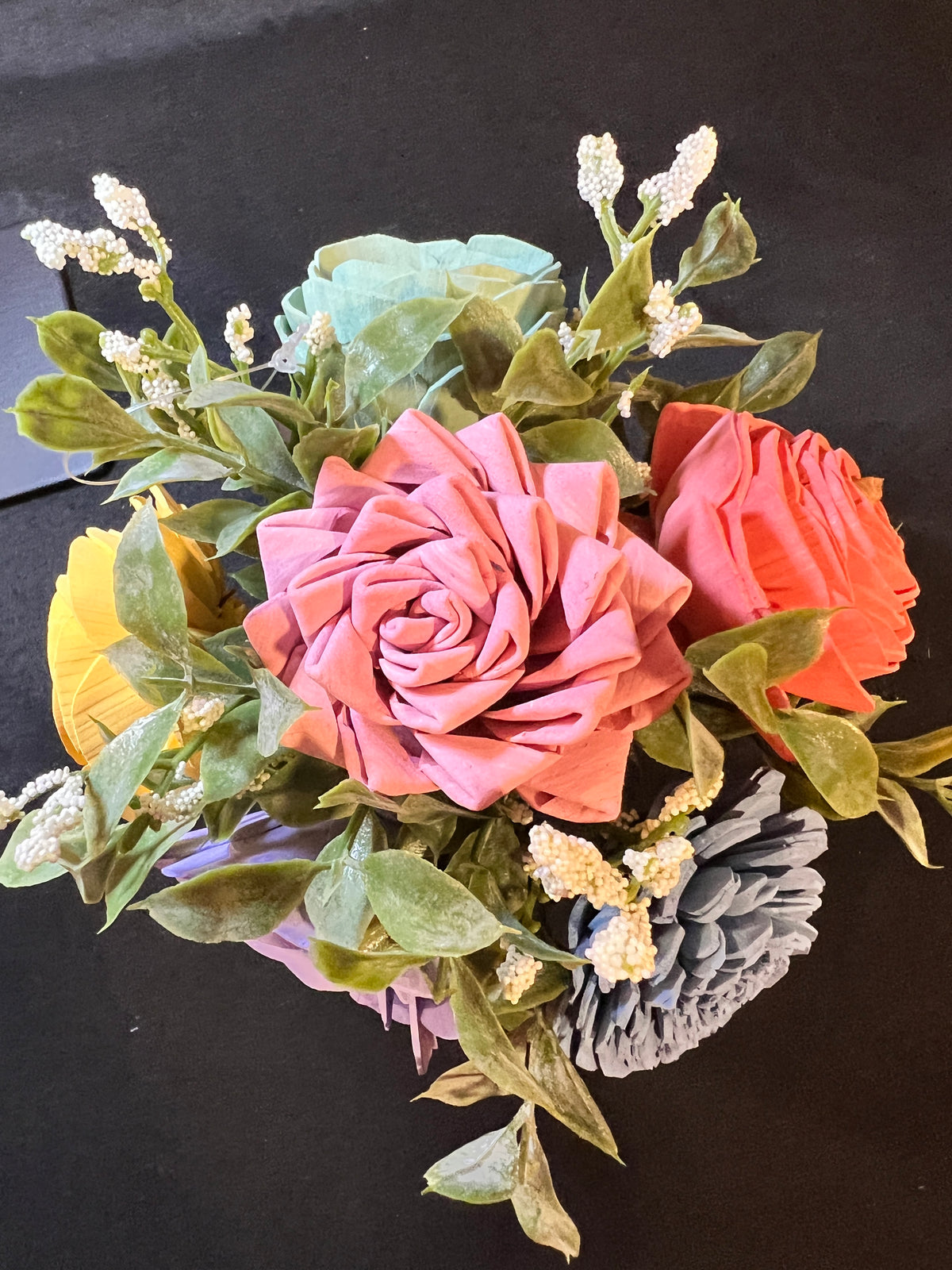 Sola wood flowers in small metal milk jug