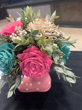 Sola wood floral arrangement in a pink ceramic rain boot