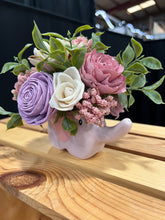 Sola wood flowers in a pink elephant