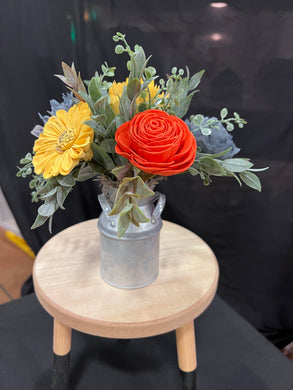 Sola wood flowers in small metal milk jug
