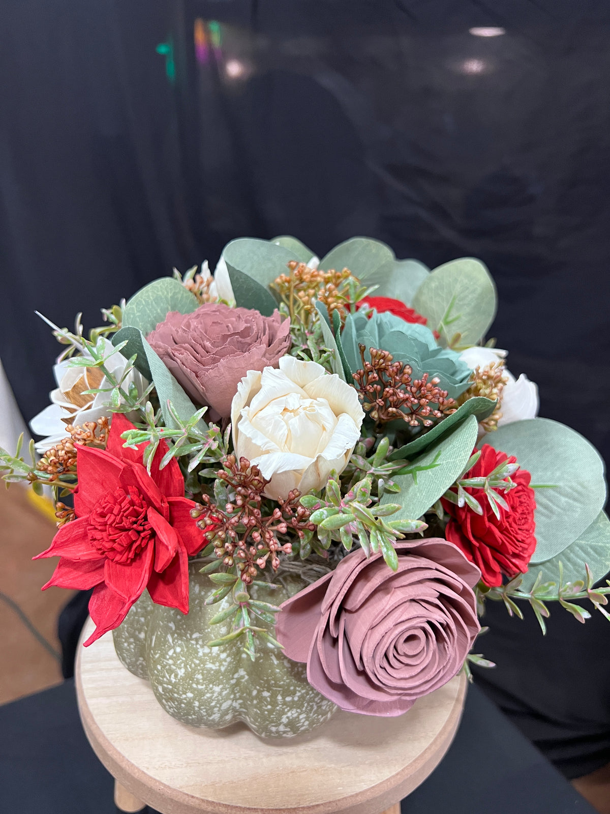 Fall Sola wood floral arrangement on pumpkin