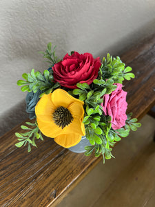 Sola wood flowers in small metal milk jug