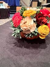 Sola wood flowers on faux pumpkin