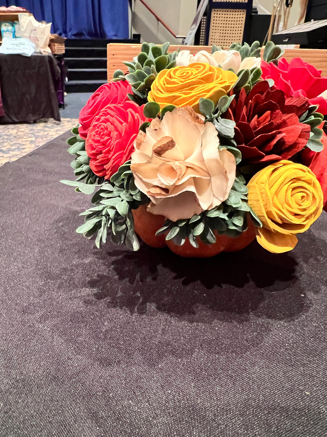 Sola wood flowers on faux pumpkin