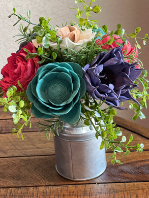 Sola wood flowers in small metal milk jug
