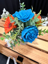 Sola wood flowers in small metal milk jug