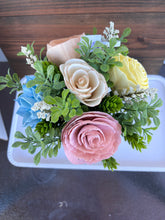 Sola wood flowers in small metal milk jug