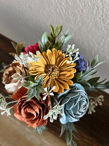 Sola wood flowers in small metal milk jug