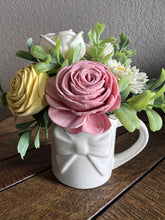 Sola wood flowers in small white ceramic cup with bow