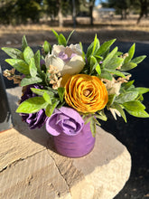Sola Wood floral arrangement in purple glass