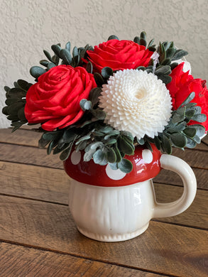 Sola wood flowers in small mushroom Cup