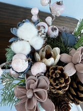 Sola Wood Flower arrangement in green holiday container.