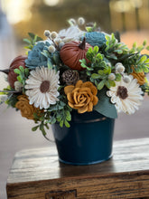 Sola wood floral arrangement in metal tin