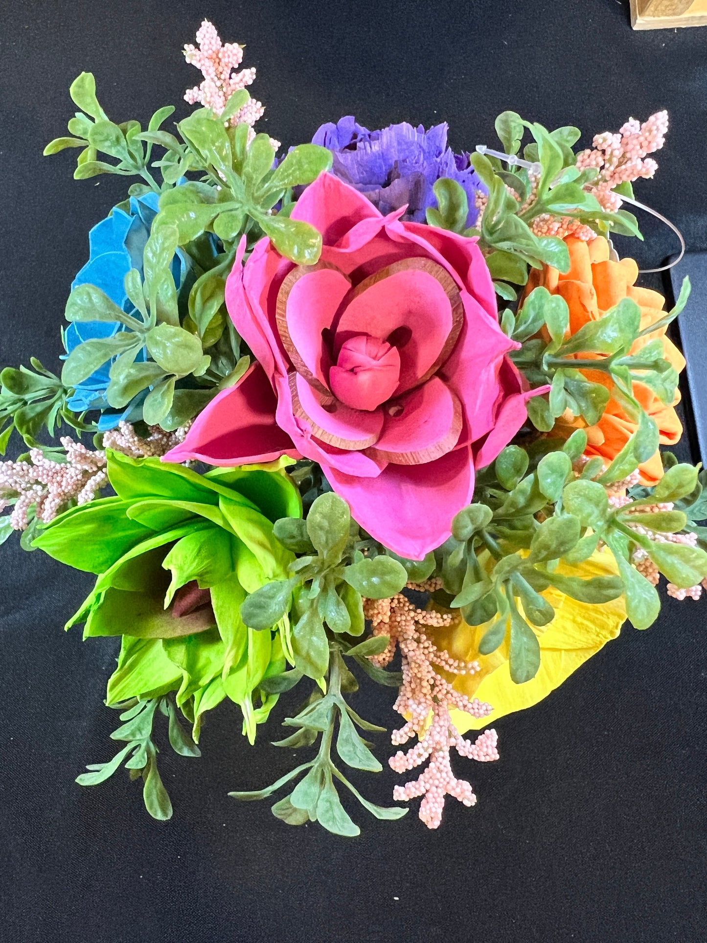Sola wood flowers in small metal milk jug