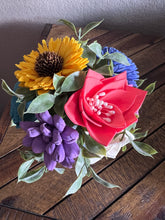 Sola wood flowers in small metal milk jug