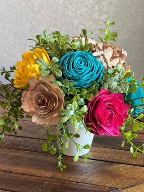 Sola Wood floral arrangement in terra cotta pot