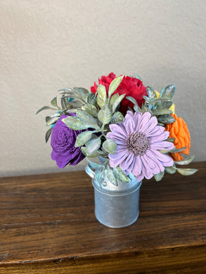 Sola wood flowers in small metal milk jug