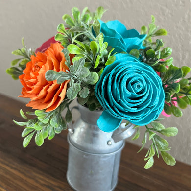 Sola wood flowers in small metal milk jug