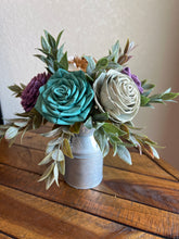 Sola wood flowers in small metal milk jug