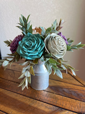 Sola wood flowers in small metal milk jug