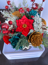Large Christmas holiday arrangement in metal container with Red Truck