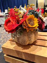 Sola wood flowers on faux pumpkin