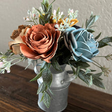 Sola wood flowers in small metal milk jug