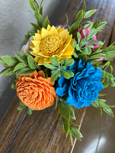 Sola wood flowers in small metal milk jug