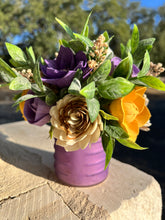 Sola Wood floral arrangement in purple glass