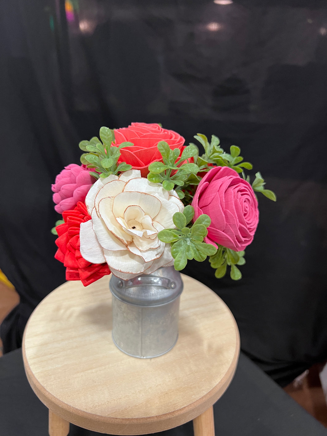 Sola wood flowers in small metal milk jug