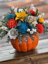 Large faux pumpkin with Sola Wood Flowers