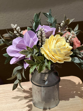 Sola wood flowers in small metal milk jug