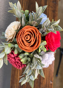 Sola wood flowers in small metal milk jug