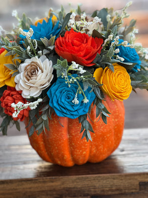 Large faux pumpkin with Sola Wood Flowers