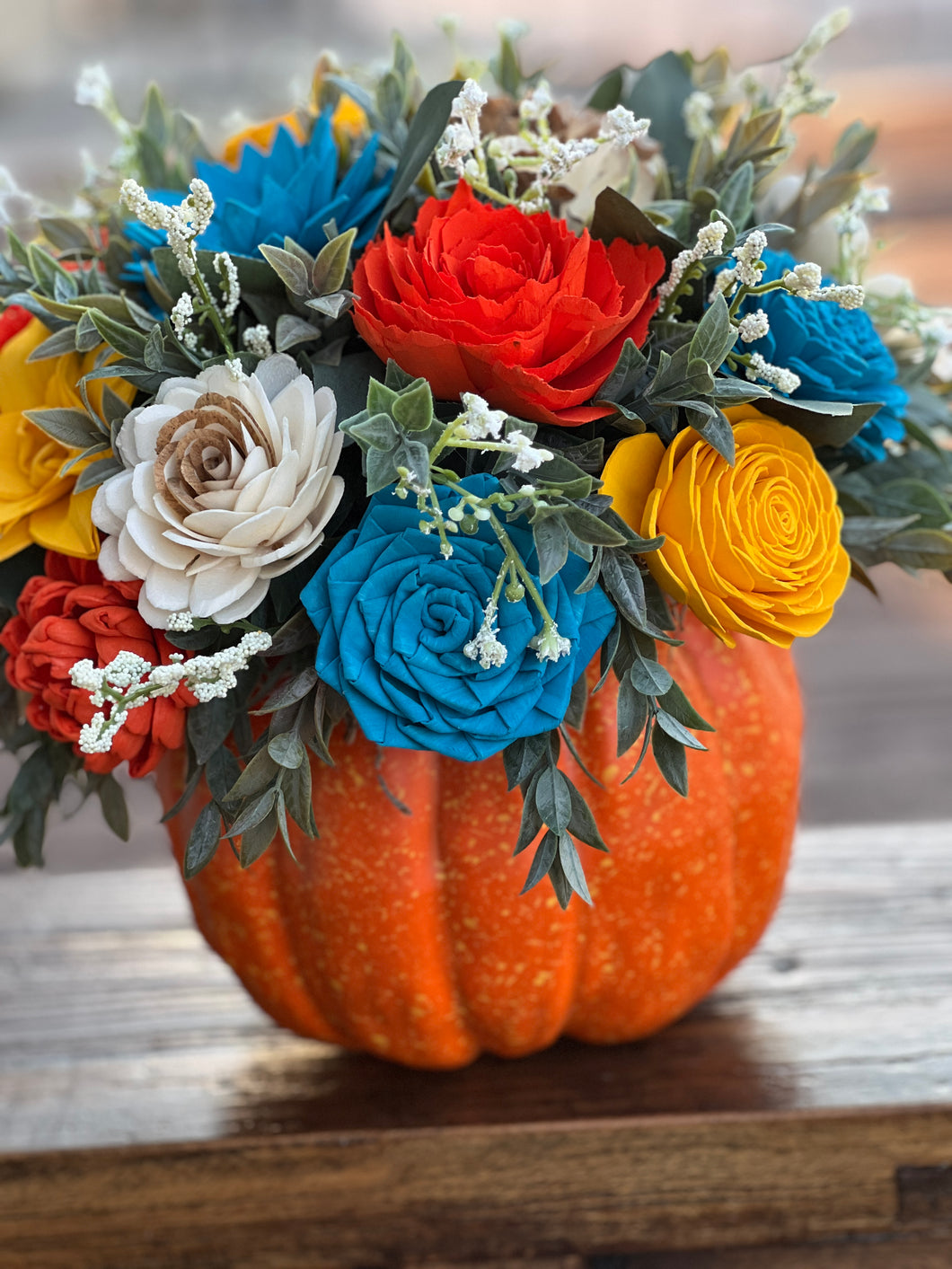 Large faux pumpkin with Sola Wood Flowers