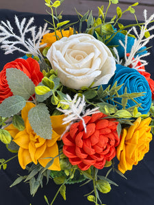 Sola wood floral arrangement in green glass container