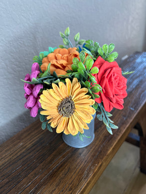 Sola wood flowers in small metal milk jug