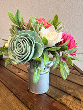 Sola wood flowers in small metal milk jug