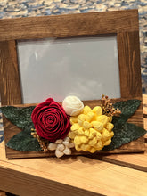 Sola wood flowers on picture frame