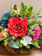 Sola wood flowers in small metal milk jug