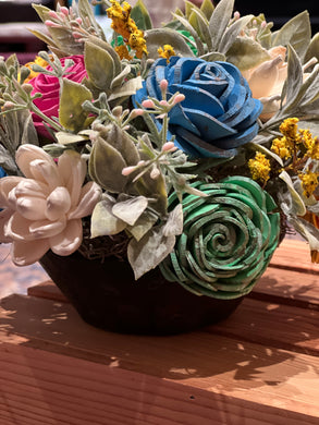Sola wood flowers in recycled wood bowl