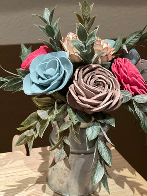 Sola wood flowers in small metal milk jug