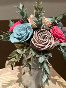 Sola wood flowers in small metal milk jug