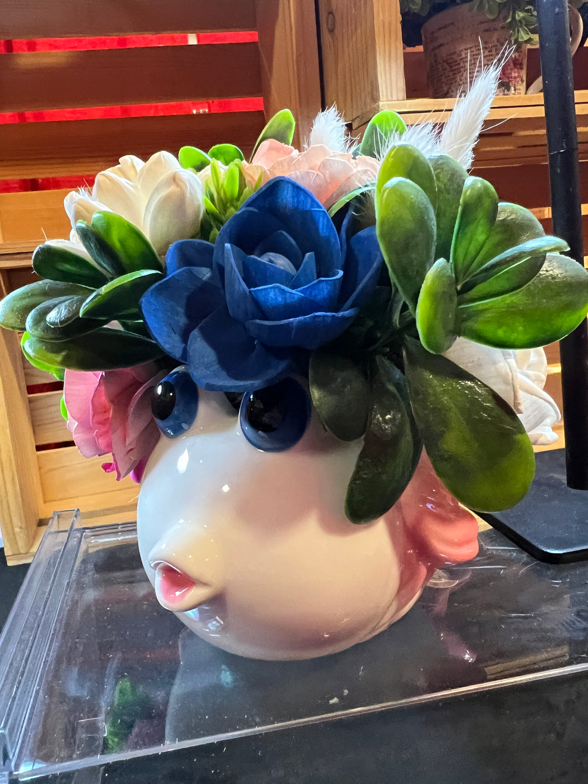 Sola wood flowers in Fish ceramic container
