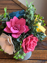 Sola wood flowers in small metal milk jug