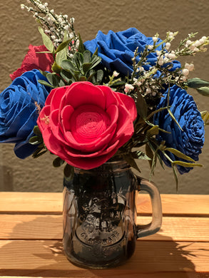 Sola Wood flowers in blue mason cup