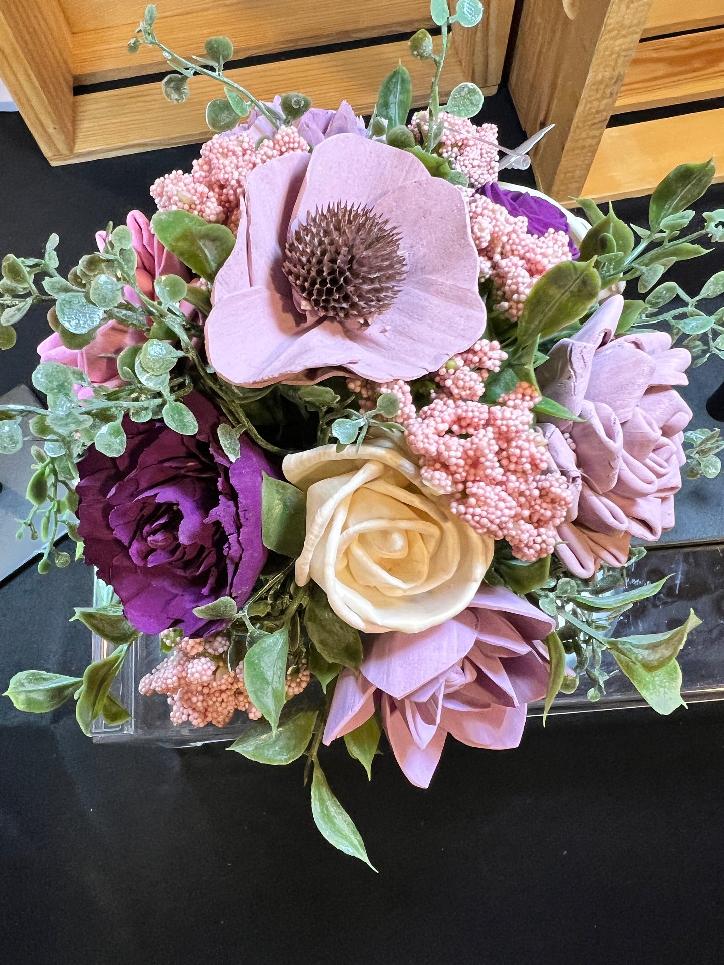 Sola wood flowers in floral ceramic container