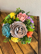 Sola wood flowers in small metal milk jug