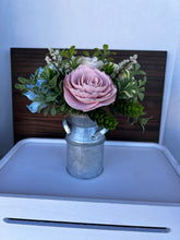 Sola wood flowers in small metal milk jug