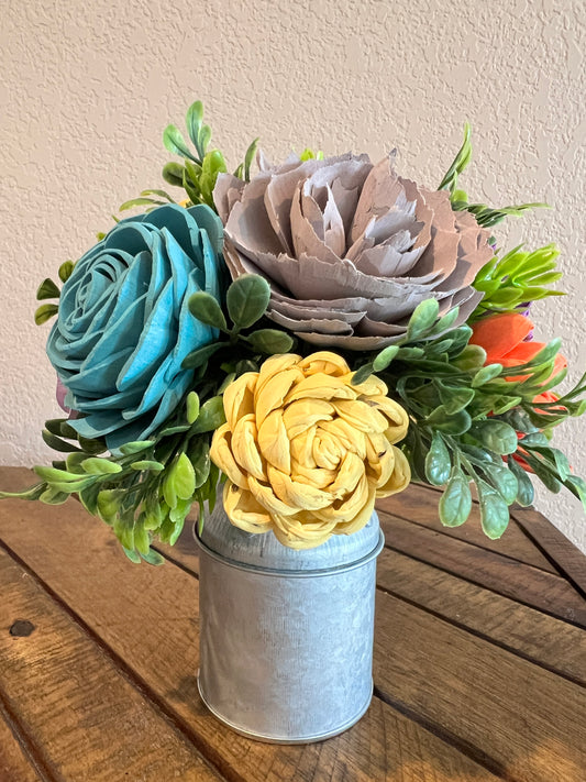 Sola wood flowers in small metal milk jug